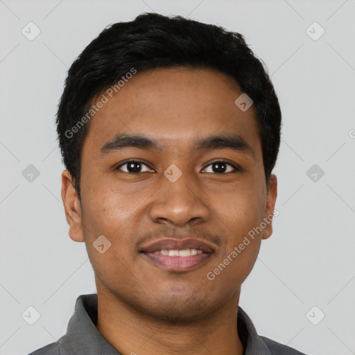 Joyful latino young-adult male with short  black hair and brown eyes