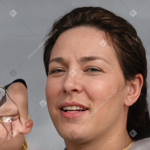 Joyful white adult female with short  brown hair and brown eyes