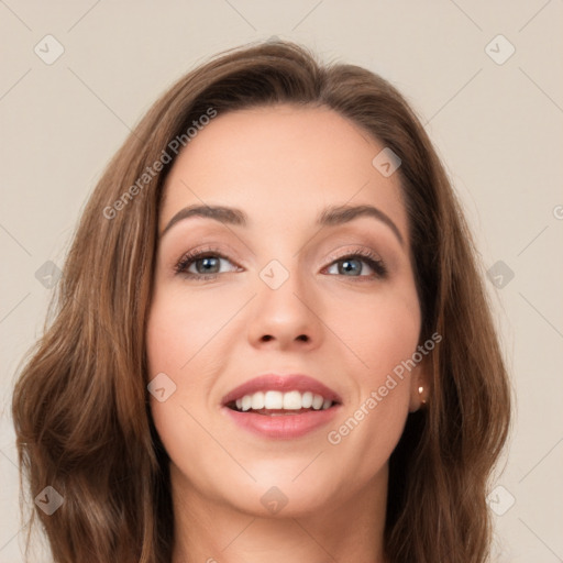 Joyful white young-adult female with long  brown hair and green eyes