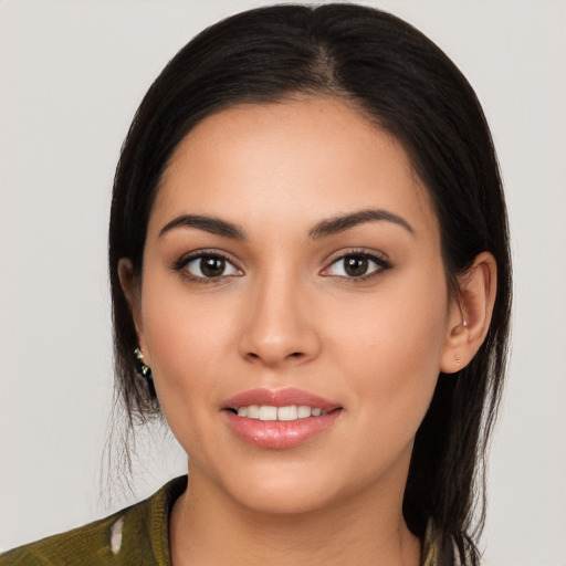 Joyful white young-adult female with long  brown hair and brown eyes