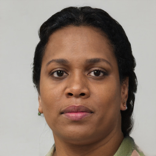 Neutral black adult female with short  brown hair and brown eyes