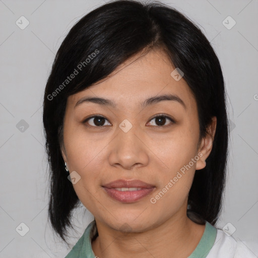 Joyful asian young-adult female with medium  black hair and brown eyes