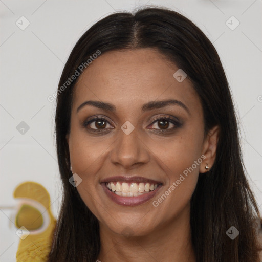 Joyful latino young-adult female with long  brown hair and brown eyes