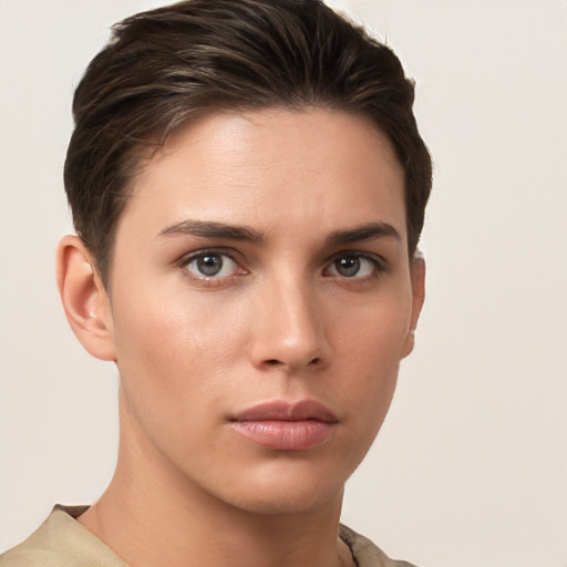 Neutral white young-adult female with short  brown hair and brown eyes