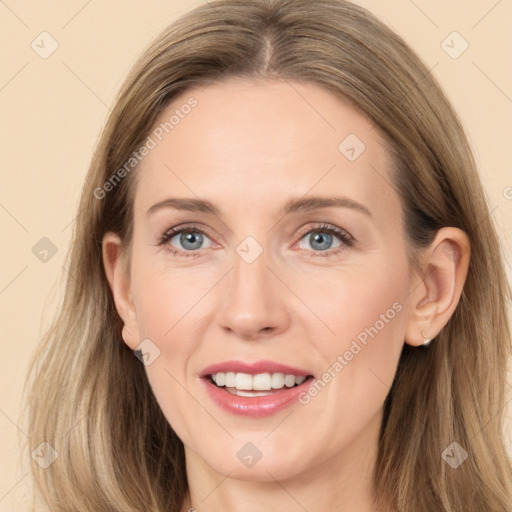 Joyful white adult female with long  brown hair and grey eyes