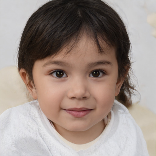 Joyful white child female with medium  brown hair and brown eyes