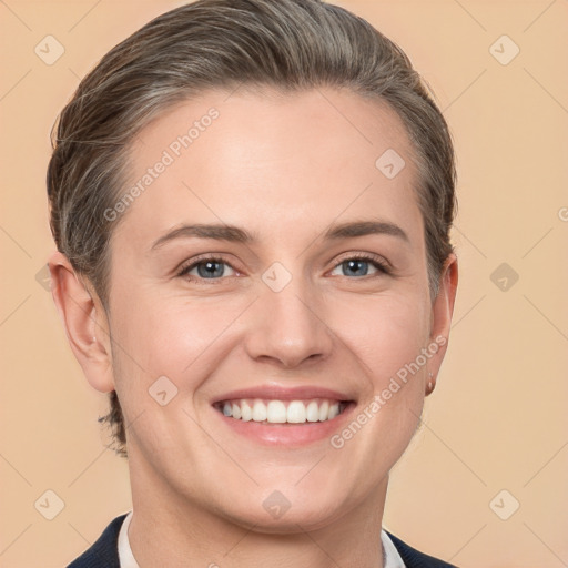 Joyful white young-adult female with short  brown hair and grey eyes