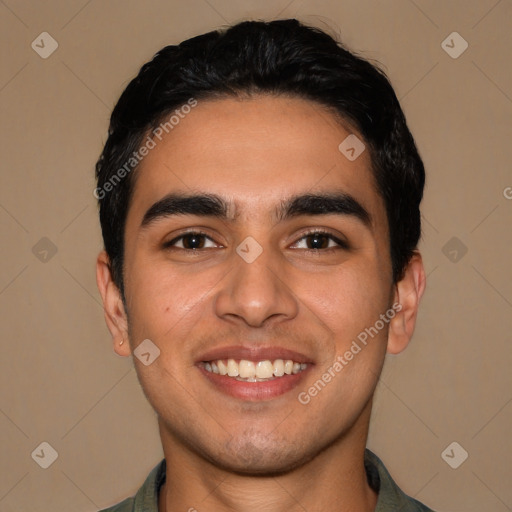 Joyful latino young-adult male with short  black hair and brown eyes