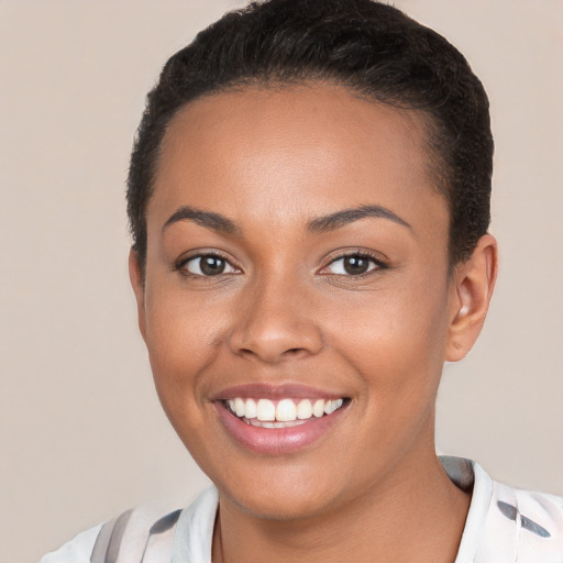 Joyful white young-adult female with short  brown hair and brown eyes