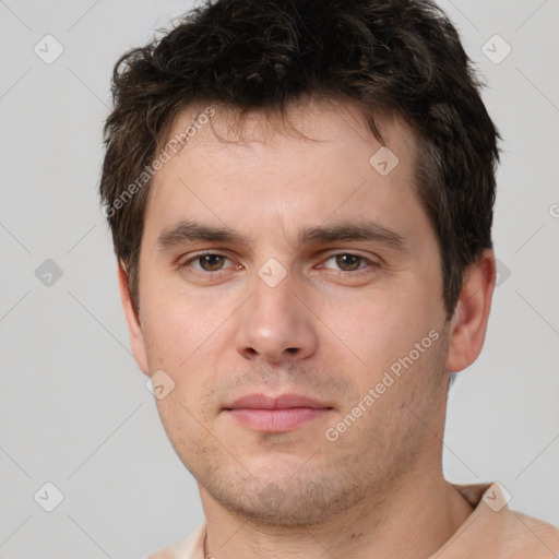 Neutral white young-adult male with short  brown hair and brown eyes