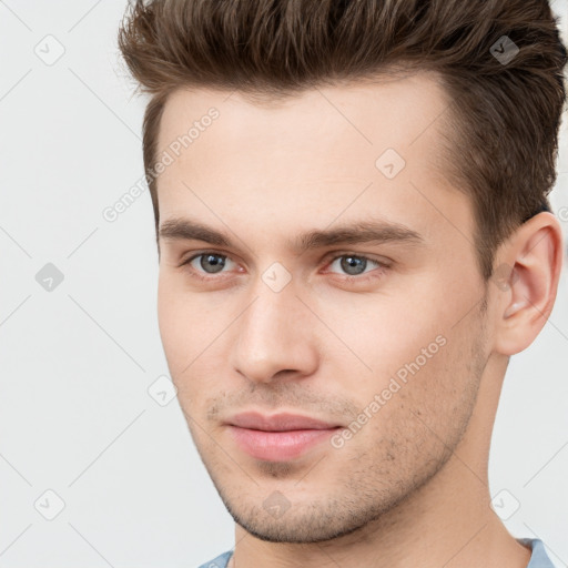 Neutral white young-adult male with short  brown hair and brown eyes