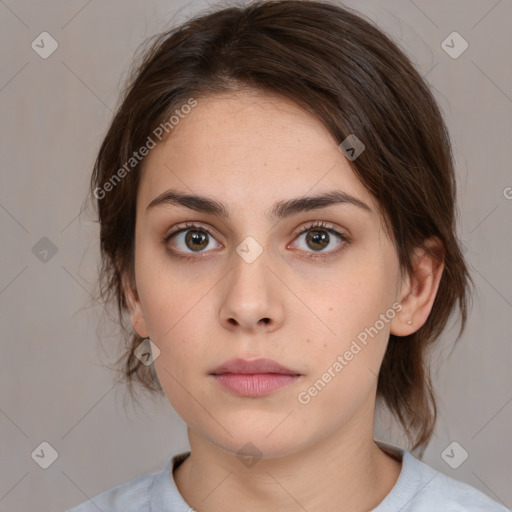 Neutral white young-adult female with medium  brown hair and brown eyes