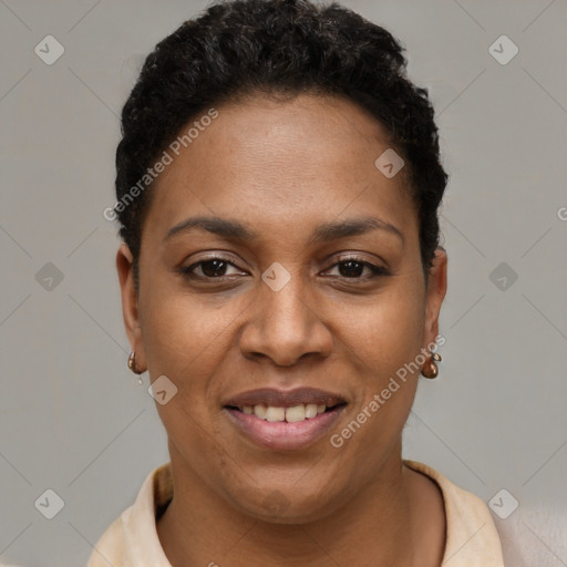 Joyful black young-adult female with short  brown hair and brown eyes