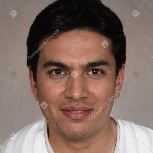 Joyful white young-adult male with short  black hair and brown eyes