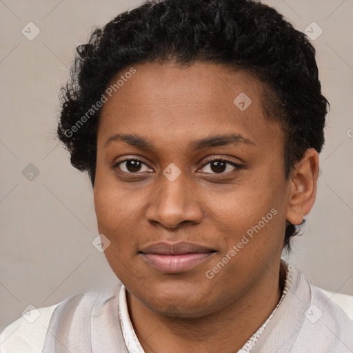 Joyful black young-adult female with short  brown hair and brown eyes