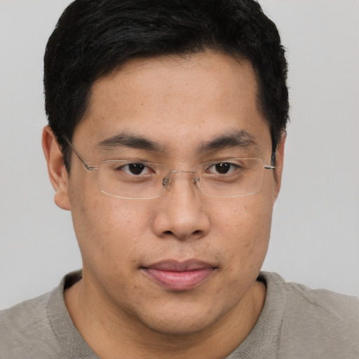 Neutral asian young-adult male with short  brown hair and brown eyes