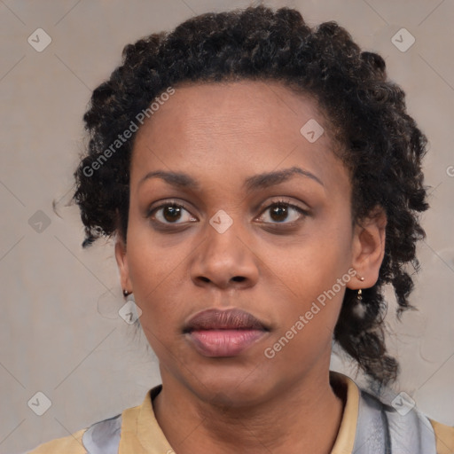 Neutral black young-adult female with short  brown hair and brown eyes