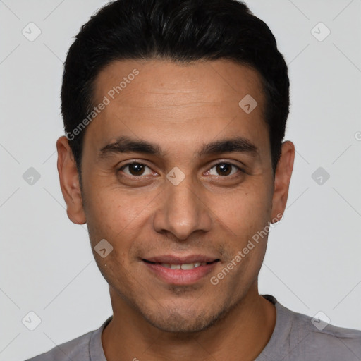 Joyful white young-adult male with short  black hair and brown eyes