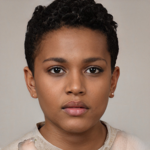 Neutral black child female with short  brown hair and brown eyes