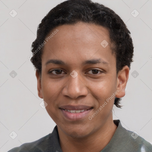 Joyful white adult male with short  black hair and brown eyes