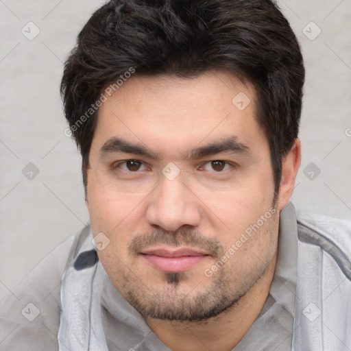 Joyful white adult male with short  brown hair and brown eyes