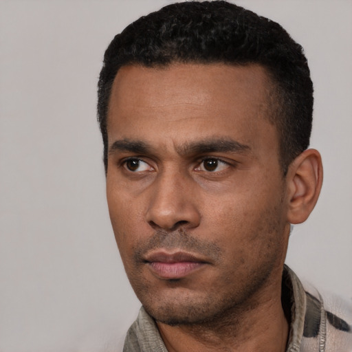 Neutral black young-adult male with short  black hair and brown eyes