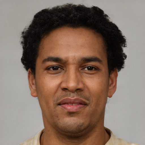 Neutral latino young-adult male with short  brown hair and brown eyes