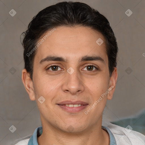 Joyful white adult male with short  brown hair and brown eyes