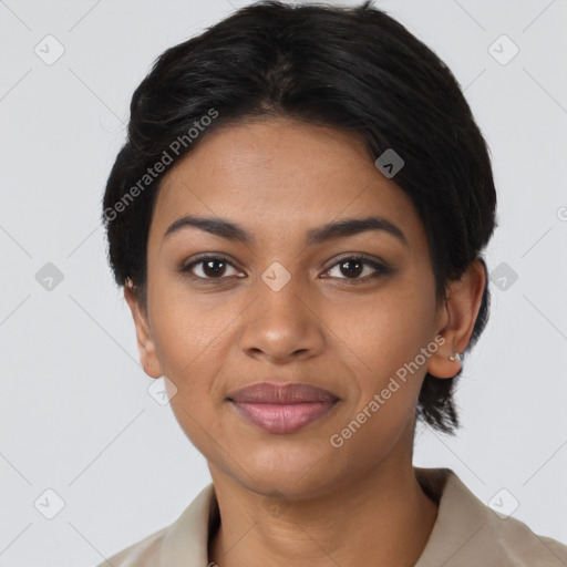 Joyful latino young-adult female with short  black hair and brown eyes