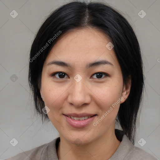 Joyful asian young-adult female with medium  black hair and brown eyes