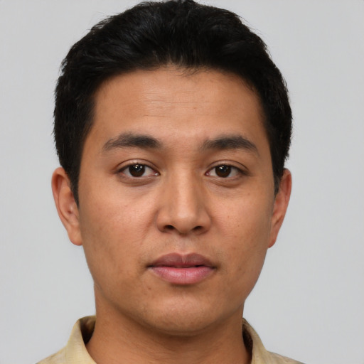 Neutral asian young-adult male with short  brown hair and brown eyes