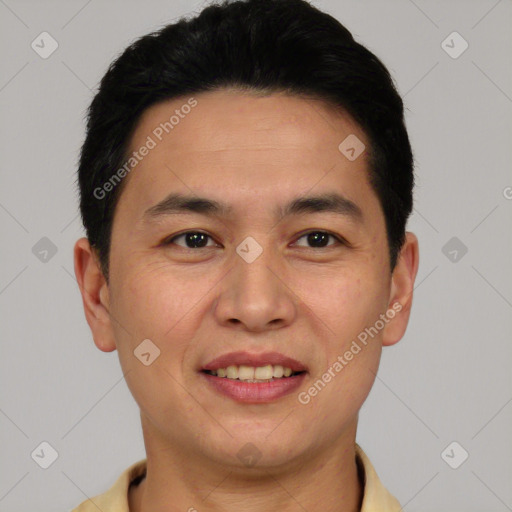 Joyful white young-adult male with short  black hair and brown eyes