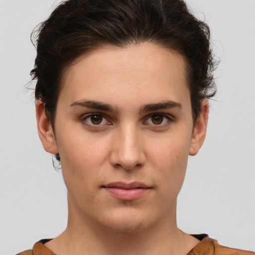 Neutral white young-adult female with short  brown hair and brown eyes