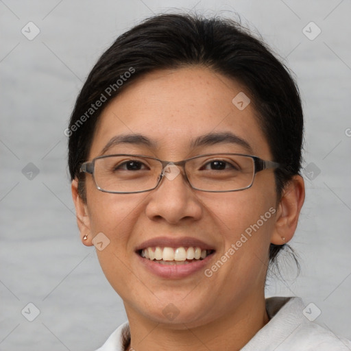 Joyful white adult female with short  brown hair and brown eyes