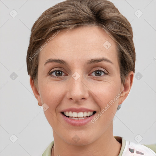 Joyful white young-adult female with short  brown hair and grey eyes