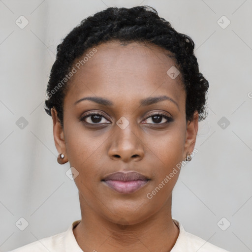 Neutral black young-adult female with short  black hair and brown eyes