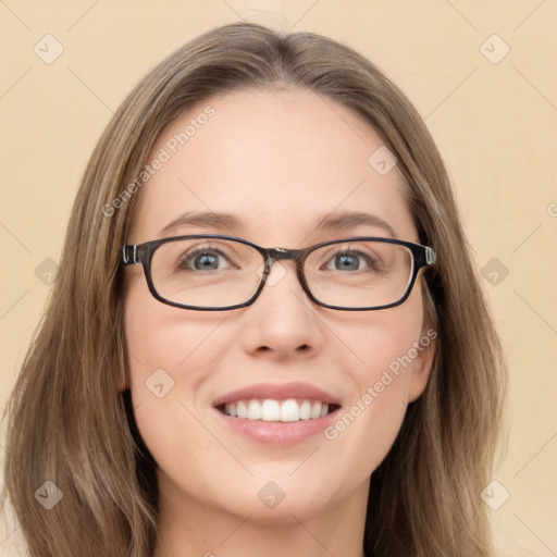 Joyful white young-adult female with long  brown hair and green eyes