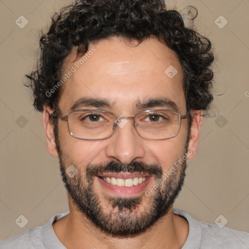 Joyful white adult male with short  black hair and brown eyes