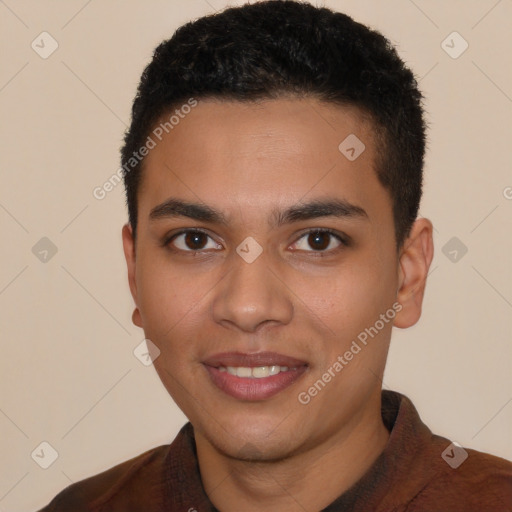 Joyful latino young-adult male with short  black hair and brown eyes