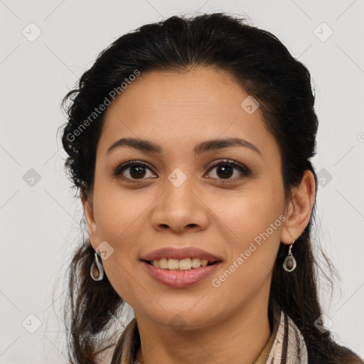 Joyful latino young-adult female with long  brown hair and brown eyes