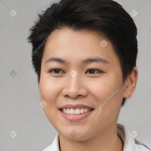 Joyful asian young-adult female with short  brown hair and brown eyes