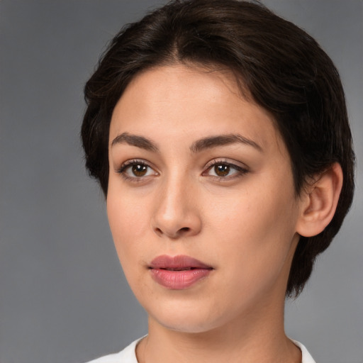 Neutral white young-adult female with medium  brown hair and brown eyes