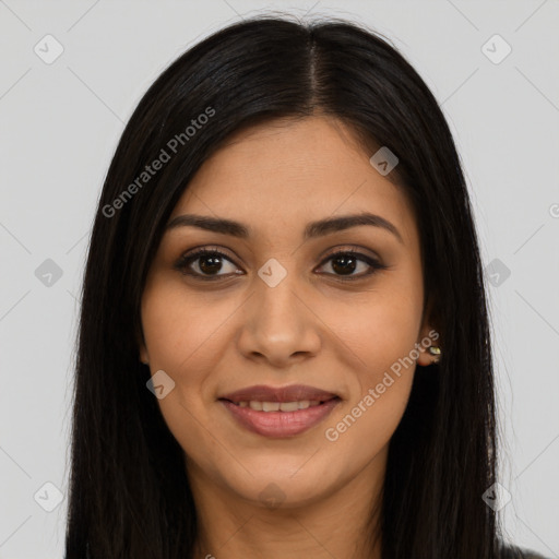 Joyful latino young-adult female with long  brown hair and brown eyes