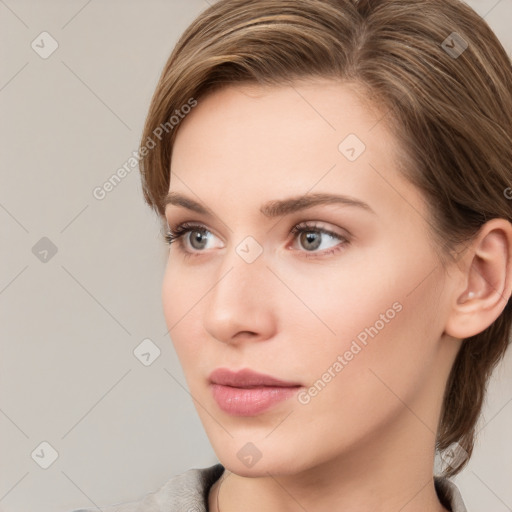 Neutral white young-adult female with medium  brown hair and grey eyes