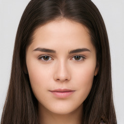 Neutral white young-adult female with long  brown hair and brown eyes