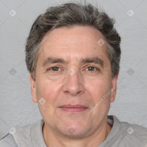 Joyful white middle-aged male with short  brown hair and brown eyes