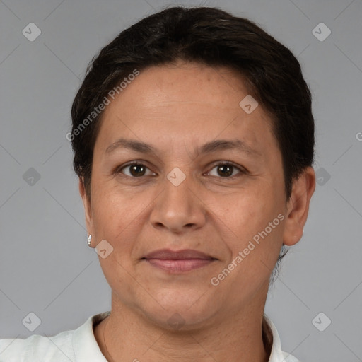 Joyful white adult female with short  brown hair and brown eyes