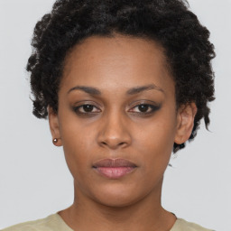 Neutral black young-adult female with short  black hair and brown eyes