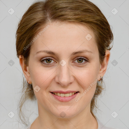 Joyful white young-adult female with medium  brown hair and green eyes