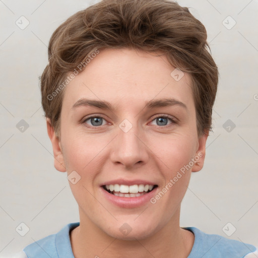 Joyful white young-adult female with short  brown hair and grey eyes